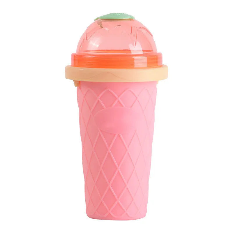 Silicone quick-freeze slush maker cup in mint green with lid and straw spoon