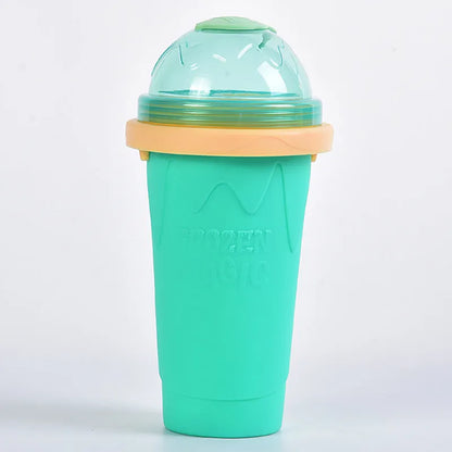 Silicone quick-freeze slush maker cup in mint green with lid and straw spoon