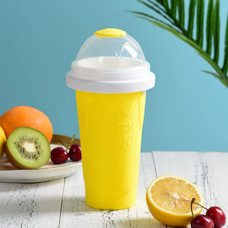 Silicone quick-freeze slush maker cup in mint green with lid and straw spoon
