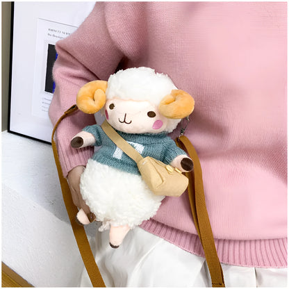 Little Sheep plush crossbody bag in blue, showing square shape, lamb pattern, and zipper.