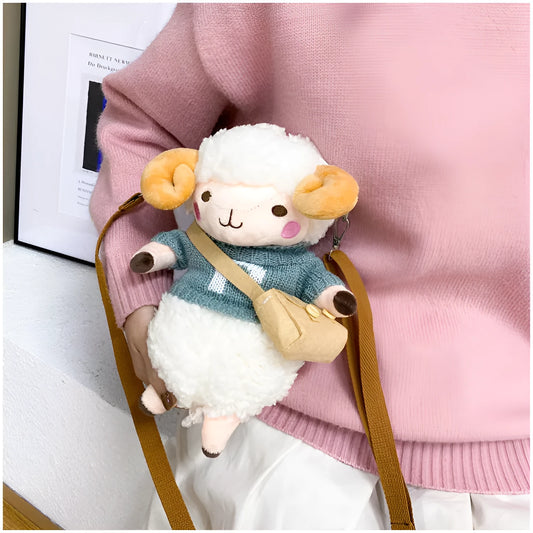 Little Sheep plush crossbody bag in blue, showing square shape, lamb pattern, and zipper.