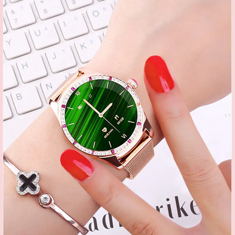 Ladies smart watch with 1.28-inch colour screen, Bluetooth calling, local music playback, health monitoring and menstrual cycle tracking features in gold or silver finish with wristband wear.