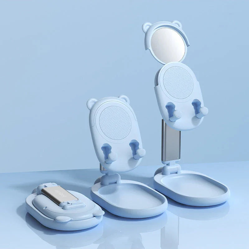 Adjustable desk phone stand with mirror for iPhones and iPads, featuring a sleek and versatile design for hands-free use and on-the-go touch-ups.