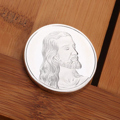 Jesus Commemorative Coin in gold and silver finishes, a spiritual keepsake for collectors and believers.