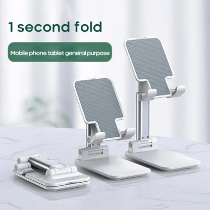 Black adjustable dual-rod lazy bracket holding a smartphone on a desktop.