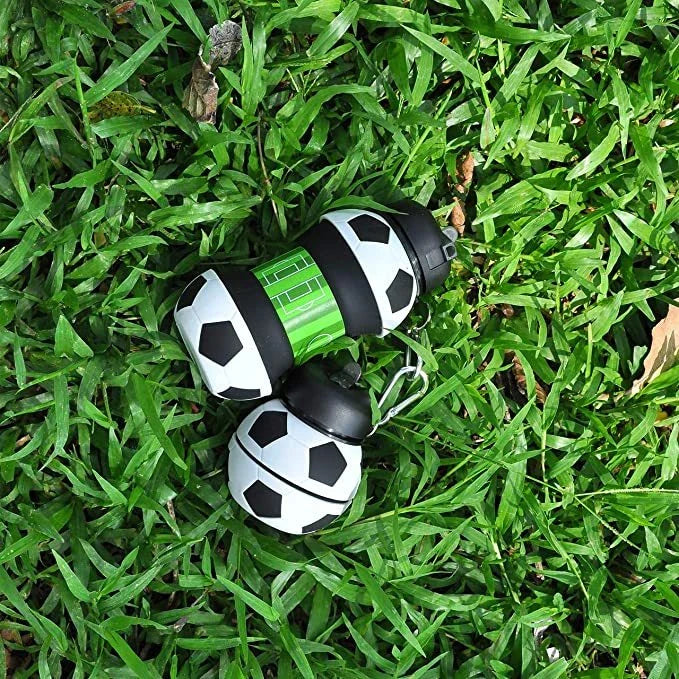 Collapsible soccer-shaped water bottle with straw, made of food-grade silicone for sports and travel hydration
