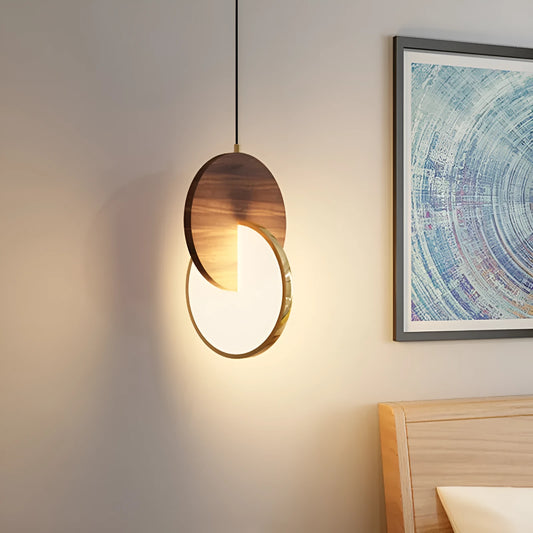 Long-line walnut wood chandelier with carved details and warm white lighting