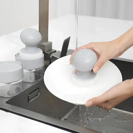 Refillable soap dispenser cleaning brush with silicone bristles and ergonomic handle for pots and pans