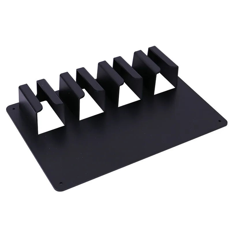 Black plastic wall-mounted hairdressing clipper display box holding four electric clippers
