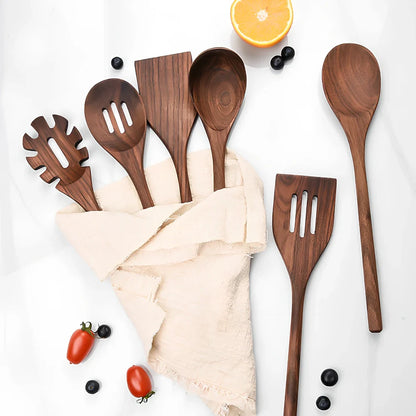 Black walnut wooden kitchen utensil set with six pieces including shovel, spatula, spoons, and spaghetti claws