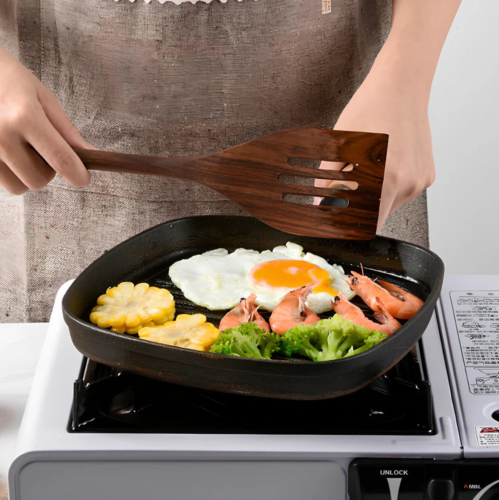 Black walnut wooden kitchen utensil set with six pieces including shovel, spatula, spoons, and spaghetti claws