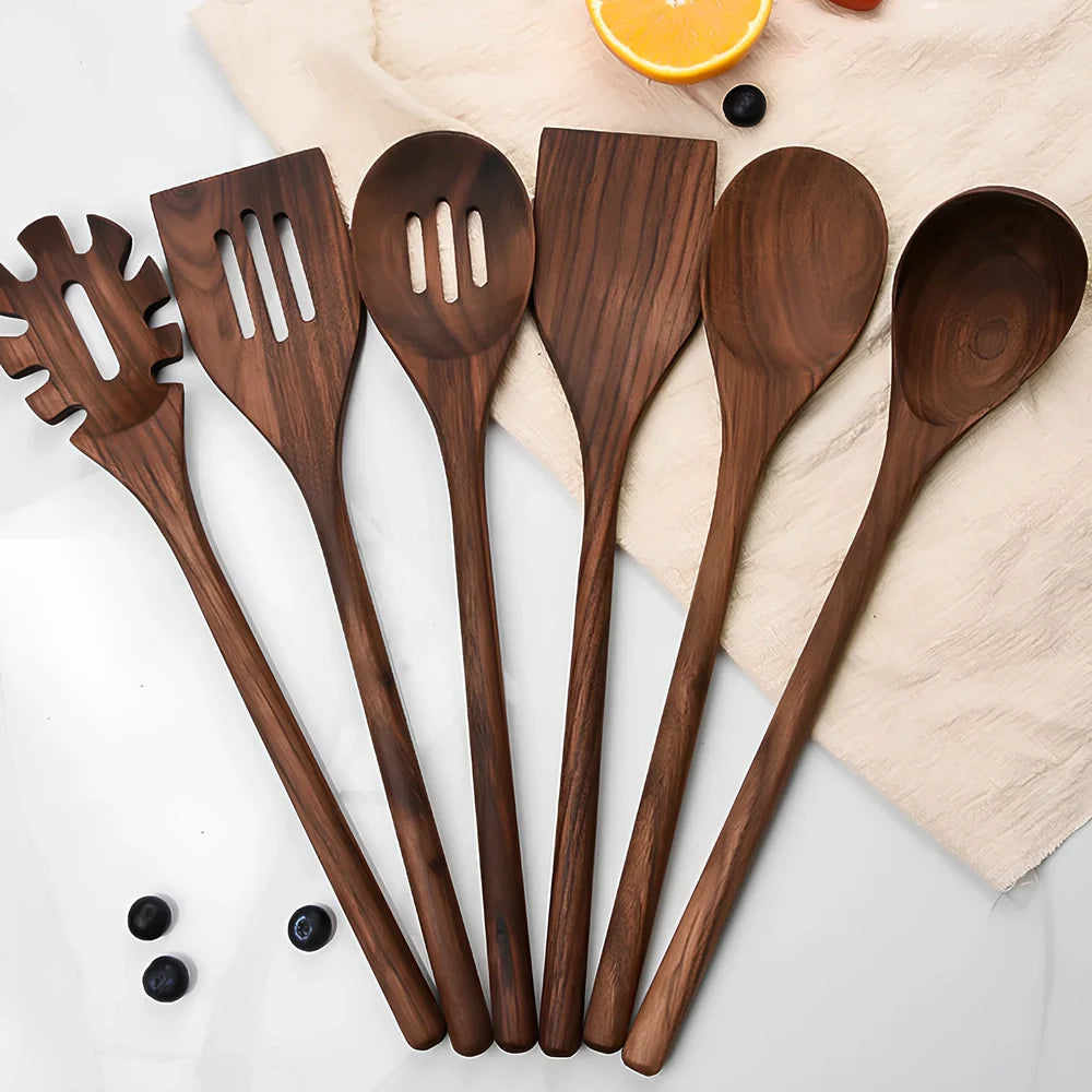 Black walnut wooden kitchen utensil set with six pieces including shovel, spatula, spoons, and spaghetti claws