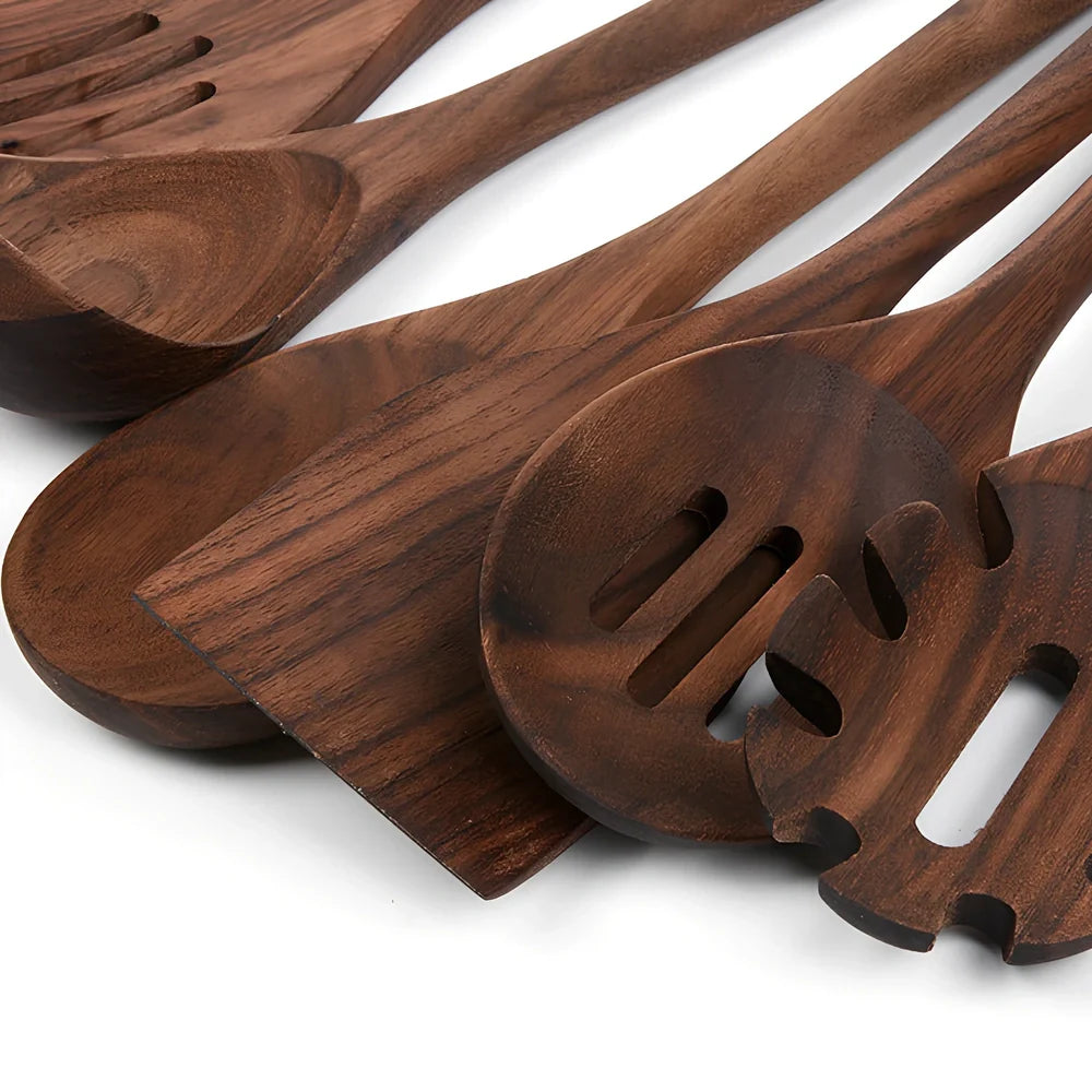Black walnut wooden kitchen utensil set with six pieces including shovel, spatula, spoons, and spaghetti claws