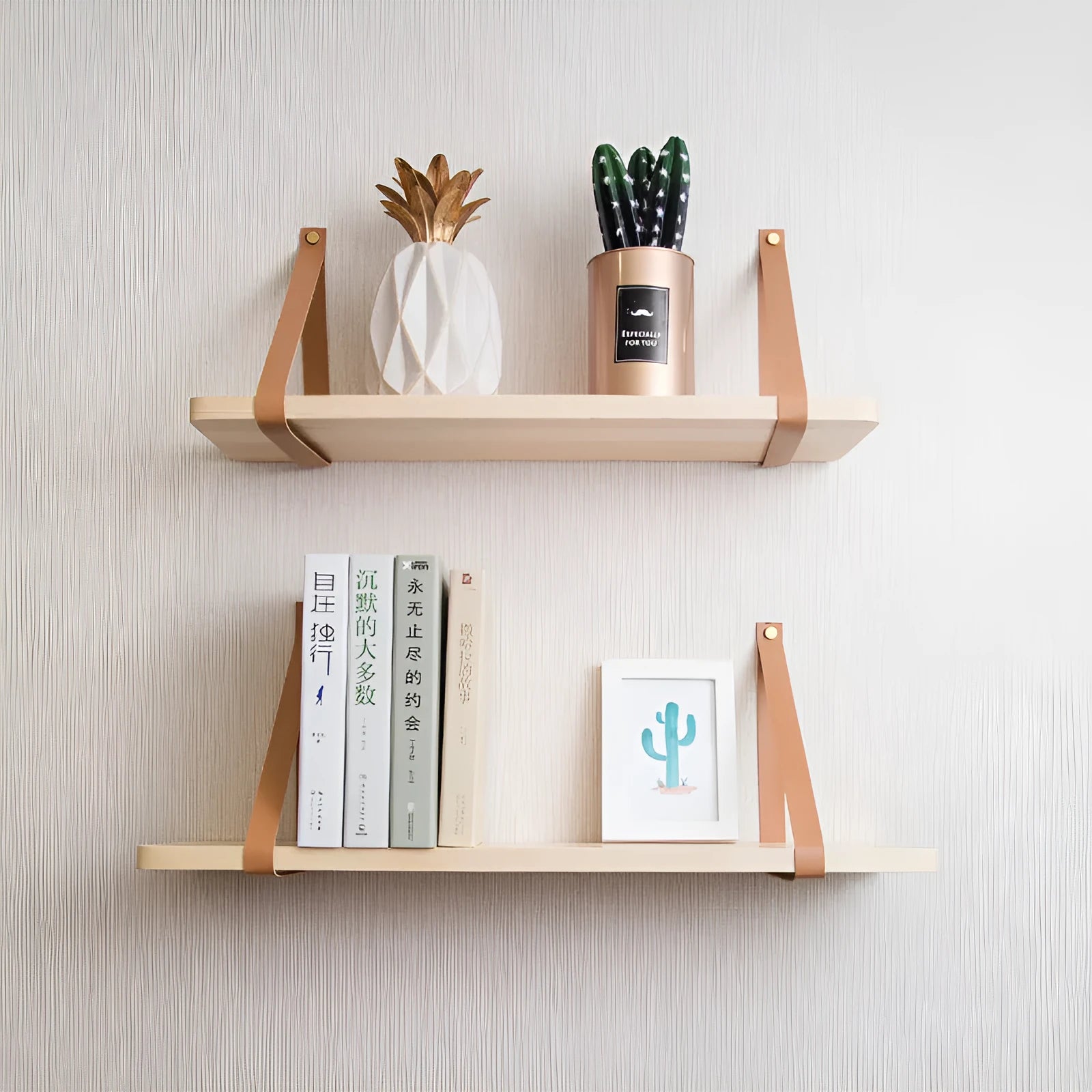 Natural pine wood wall mounted shelf with books and small items organised on it.
