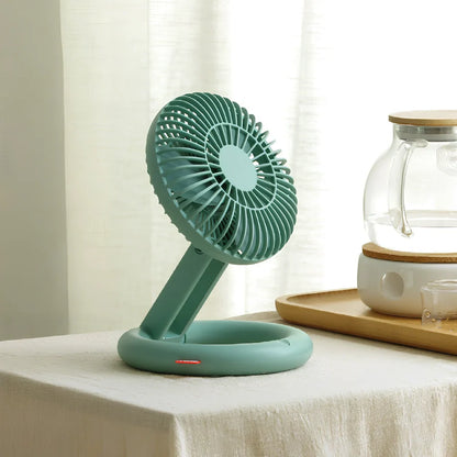 White retractable USB fan showing folded and open positions with USB cable