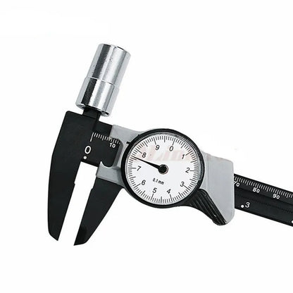 Black and white plastic vernier caliper showing 0-150mm scale with 0.1mm graduations