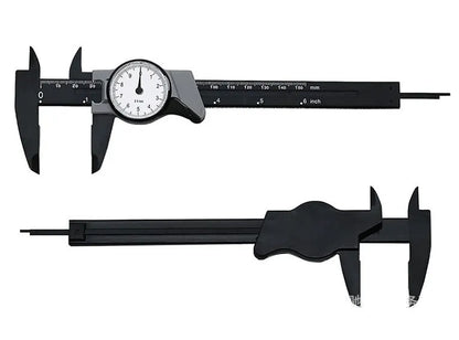 Black and white plastic vernier caliper showing 0-150mm scale with 0.1mm graduations