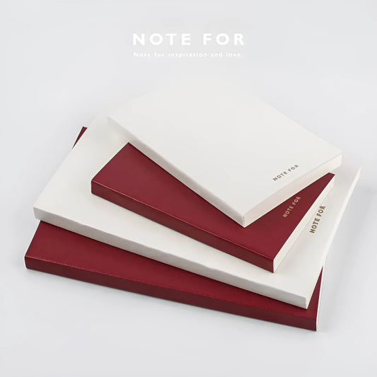 Red and white retro-style notebooks with imitation leather covers in A5 and A6 sizes showing dot grid, line, and square ruling pages.