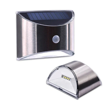 White solar step lights measuring 10cm long on outdoor brick steps with LED illumination