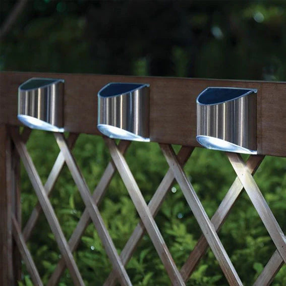 White solar step lights measuring 10cm long on outdoor brick steps with LED illumination