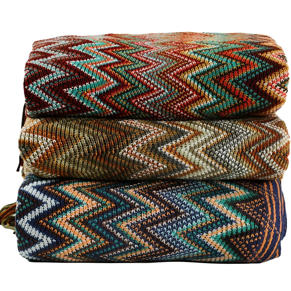 Bohemian striped knitted blanket with fringe detailing in blue, red, yellow or coffee colours