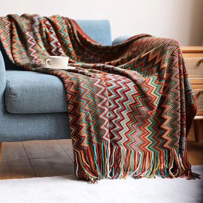 Bohemian striped knitted blanket with fringe detailing in blue, red, yellow or coffee colours
