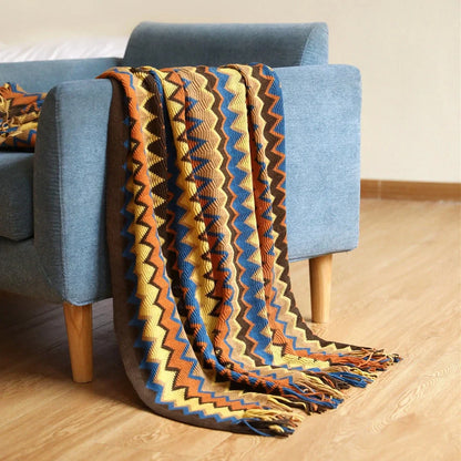 Bohemian striped knitted blanket with fringe detailing in blue, red, yellow or coffee colours
