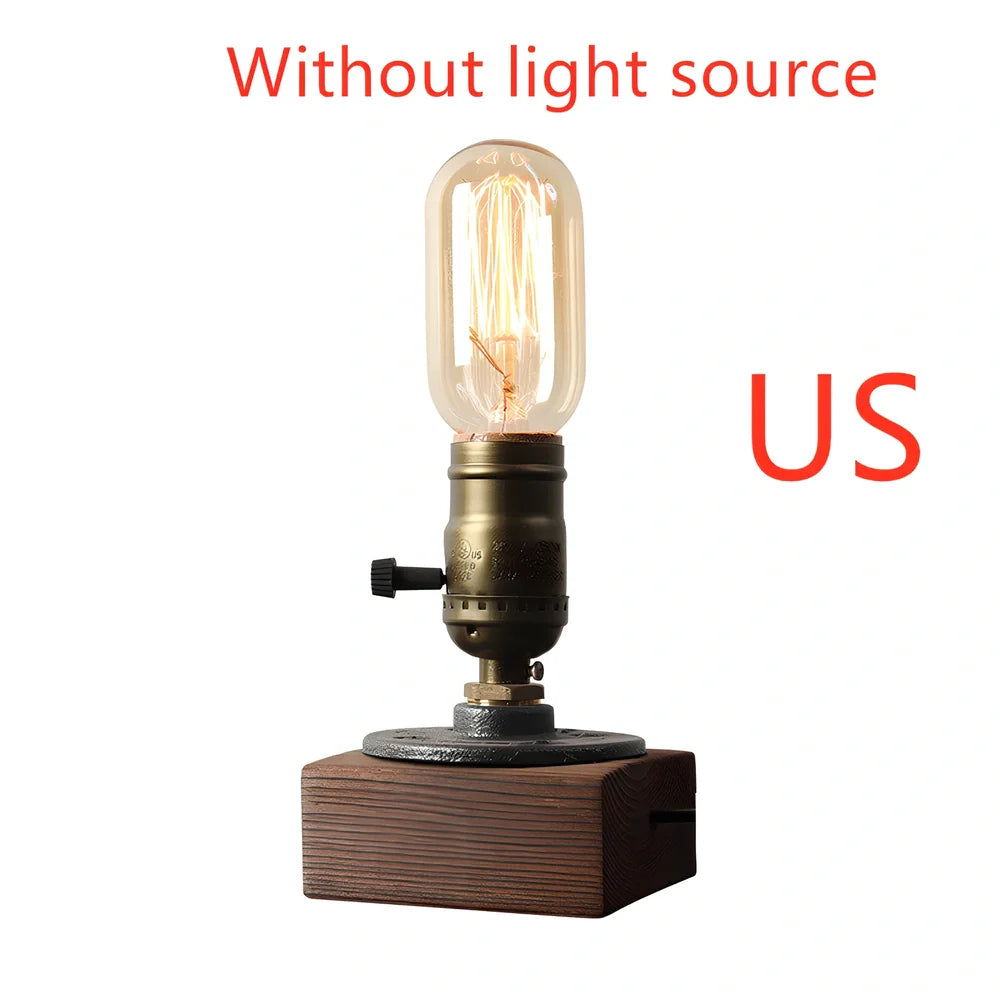 Water pipe table lamp with wood and iron construction measuring 9cm wide by 13cm tall