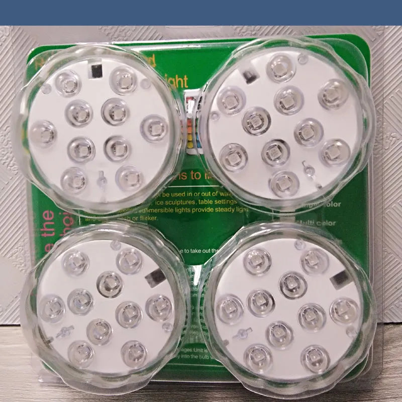White waterproof remote control LED light with IP68 rating for pools and gardens.