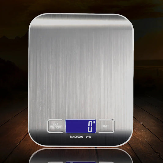 Gold stainless steel kitchen scale with electronic display showing weight measurement