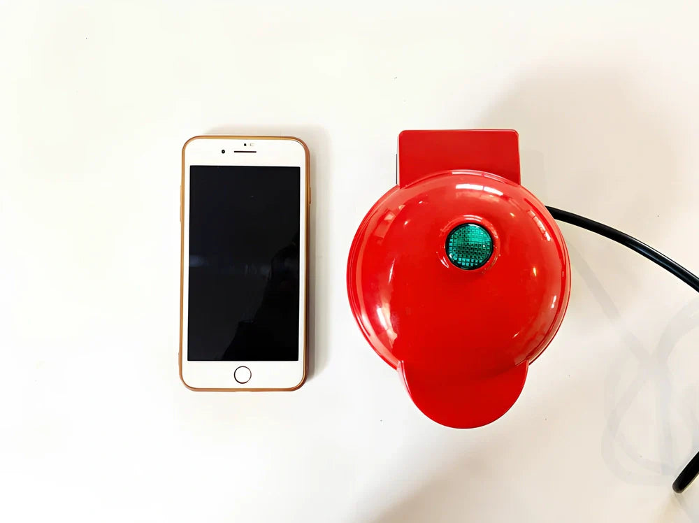 Red electric waffle maker measuring 10x15x20cm with EU plug for bubble egg cakes and pancakes