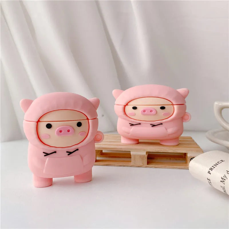 Pink silicone pig earphone case with flip lid and carabiner hook for Apple AirPods.