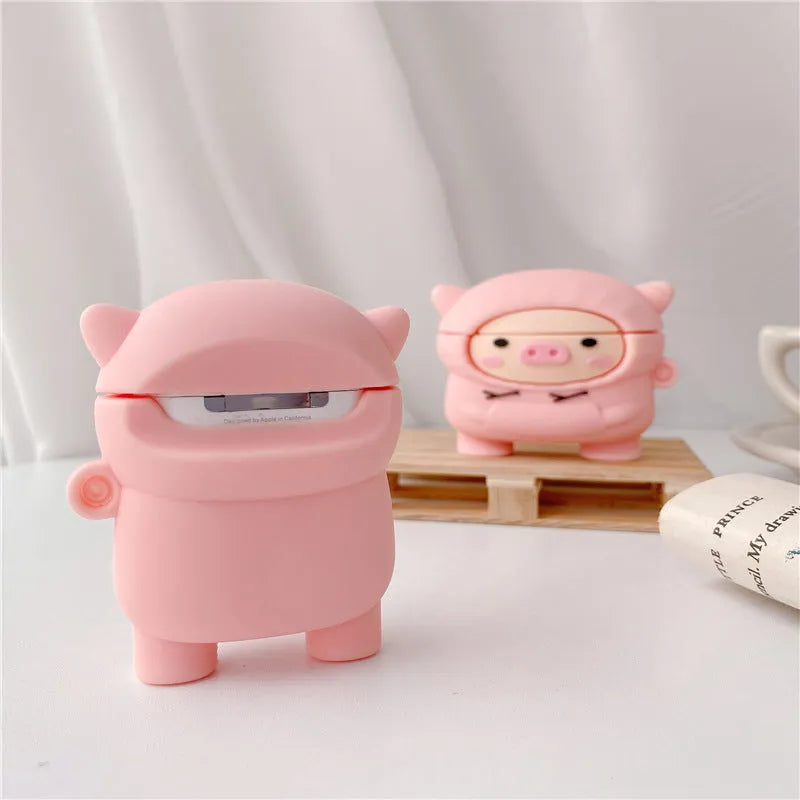 Pink silicone pig earphone case with flip lid and carabiner hook for Apple AirPods.