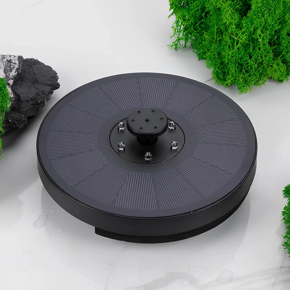 Solar fountain pump with LED lighting showing water flow and engineering plastic housing