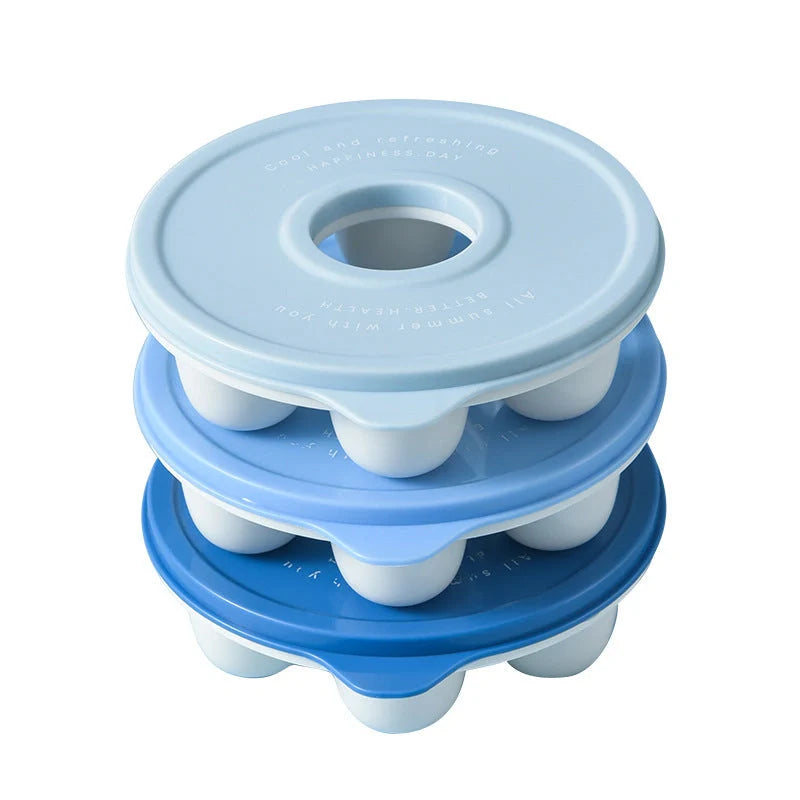 Donut-shaped ice cube molds in orange and blue, perfect for creative drink presentation.