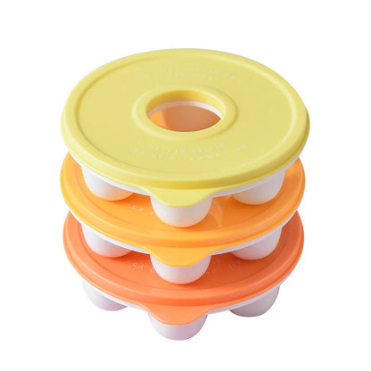 Donut-shaped ice cube molds in orange and blue, perfect for creative drink presentation.