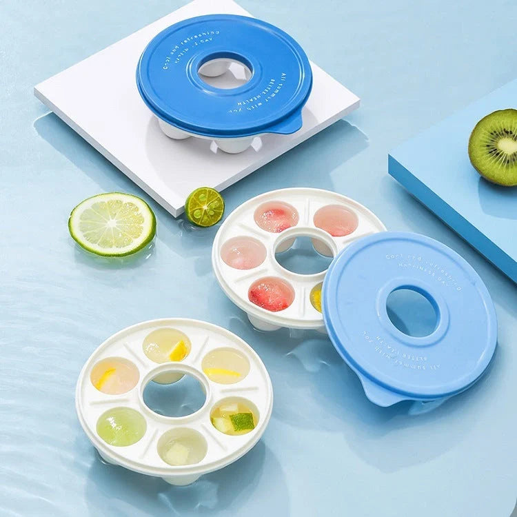 Donut-shaped ice cube molds in orange and blue, perfect for creative drink presentation.