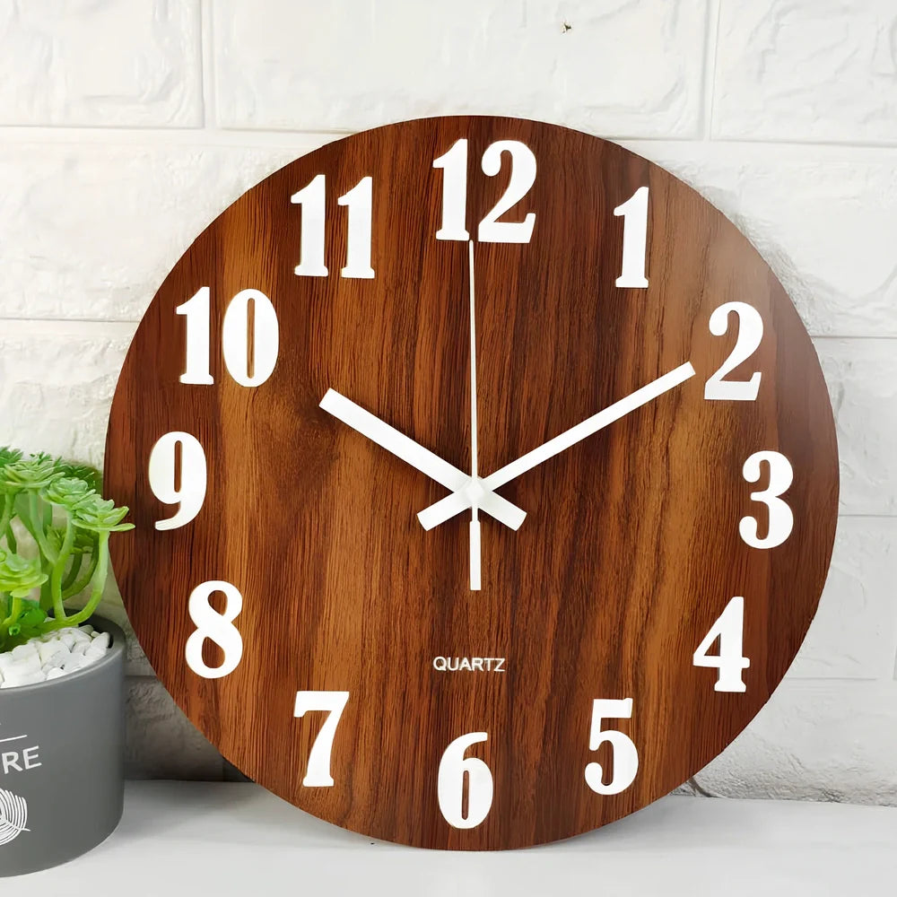 Round wood grain luminous wall clock with glowing numbers in dark room setting