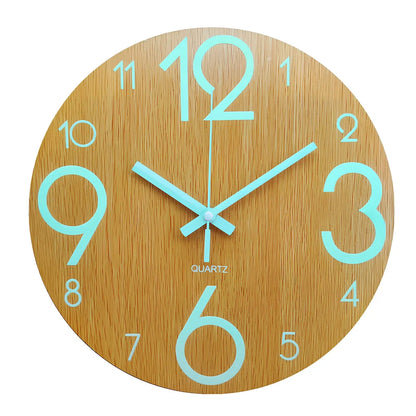 Round wood grain luminous wall clock with glowing numbers in dark room setting