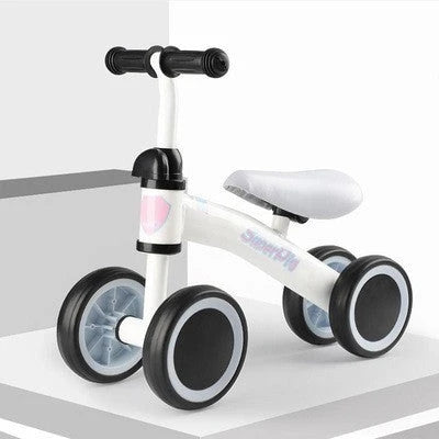 A stylish no-pedal balance bike with three wheels, vibrant colors, and optional light-up and music features for kids