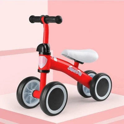 A stylish no-pedal balance bike with three wheels, vibrant colors, and optional light-up and music features for kids