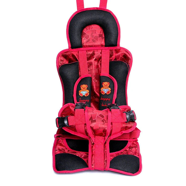 Portable toddler safety mat with adjustable harness on a chair