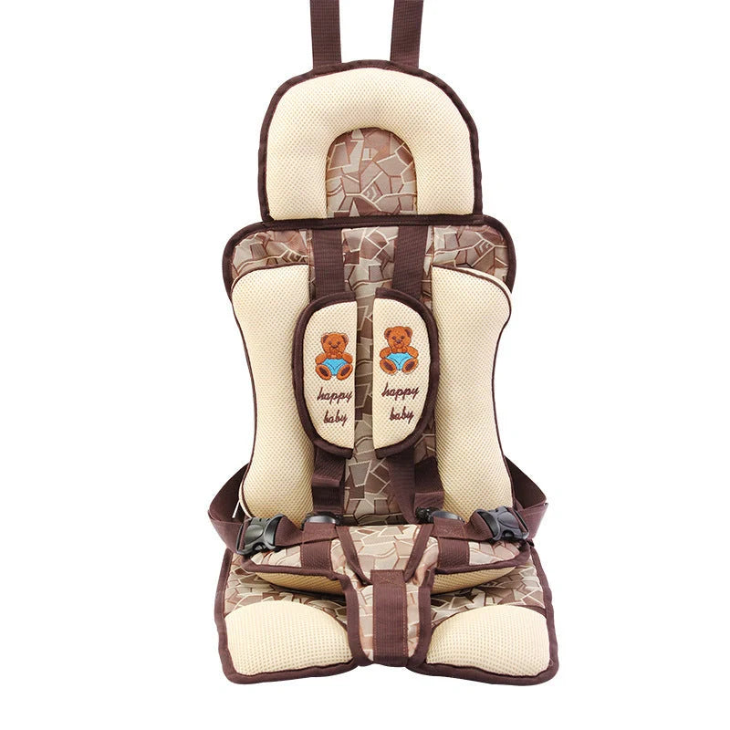 Portable toddler safety mat with adjustable harness on a chair