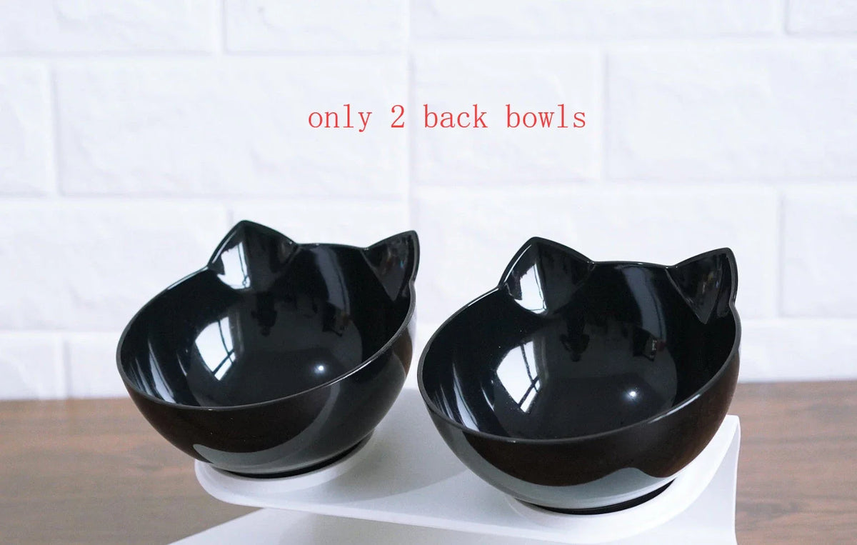 An inclined cat food bowl with a transparent design and a sturdy base, providing a comfortable and hygienic dining experience for your feline friend.