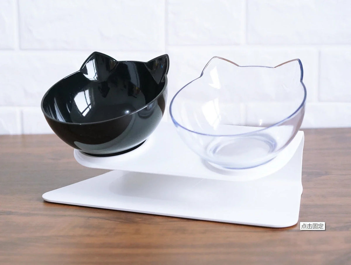 An inclined cat food bowl with a transparent design and a sturdy base, providing a comfortable and hygienic dining experience for your feline friend.