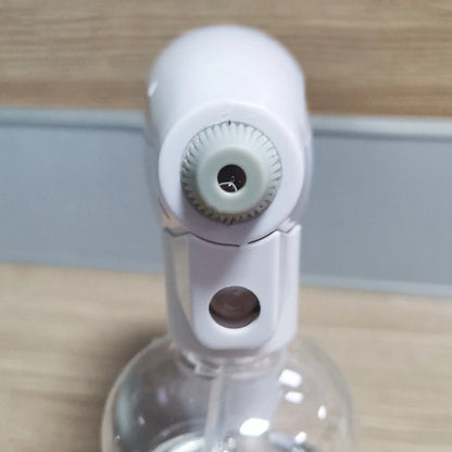 White cordless handheld electric spray disinfection gun with USB charging cable