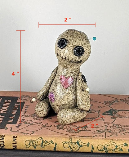 Handcrafted voodoo doll cone incense burner with smoke effect from eyes and mouth