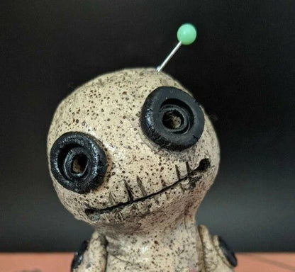 Handcrafted voodoo doll cone incense burner with smoke effect from eyes and mouth