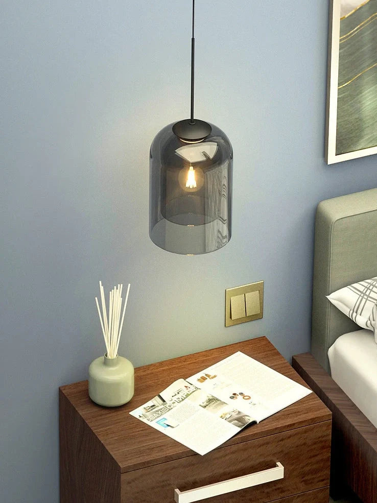 Nordic wall lamp with glass shade in amber colour, E27 holder, and compact 15 mm dimensions for wall mounting.