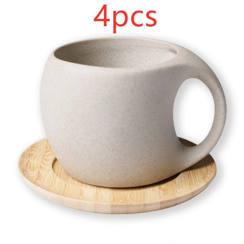 Elegant Ceramic Cold Brew Kettle Set with matching cups on bamboo tray